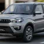 Mahindra Quanto 2025 family SUV in urban setting showcasing its sleek design, powerful performance, and off-road capability